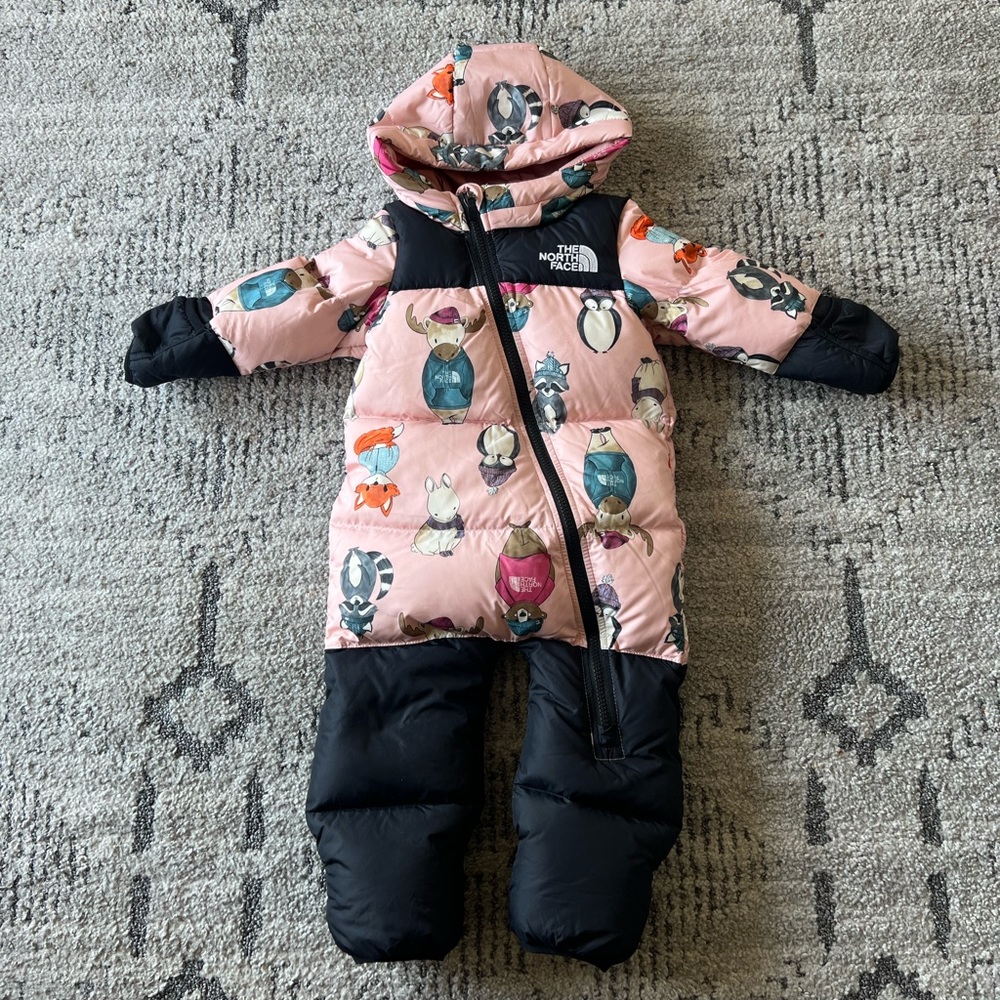 The North Face Infant Nuptse One-Piece 12-18 months peach and critters print.